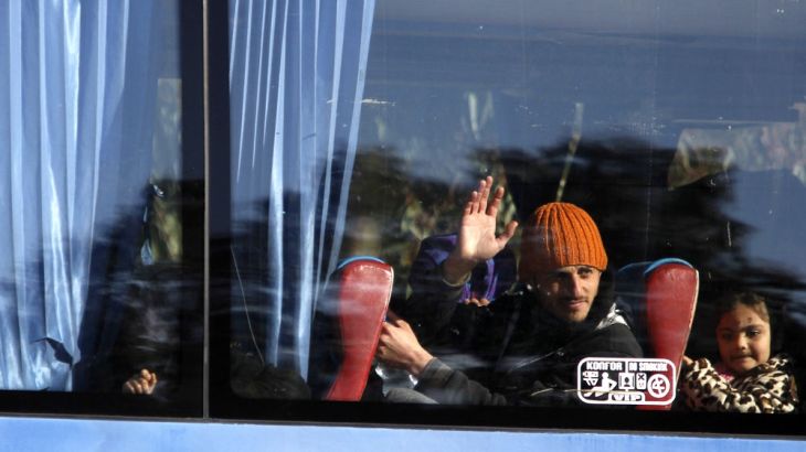 Syria rebels leave Homs following rare ceasefire deal