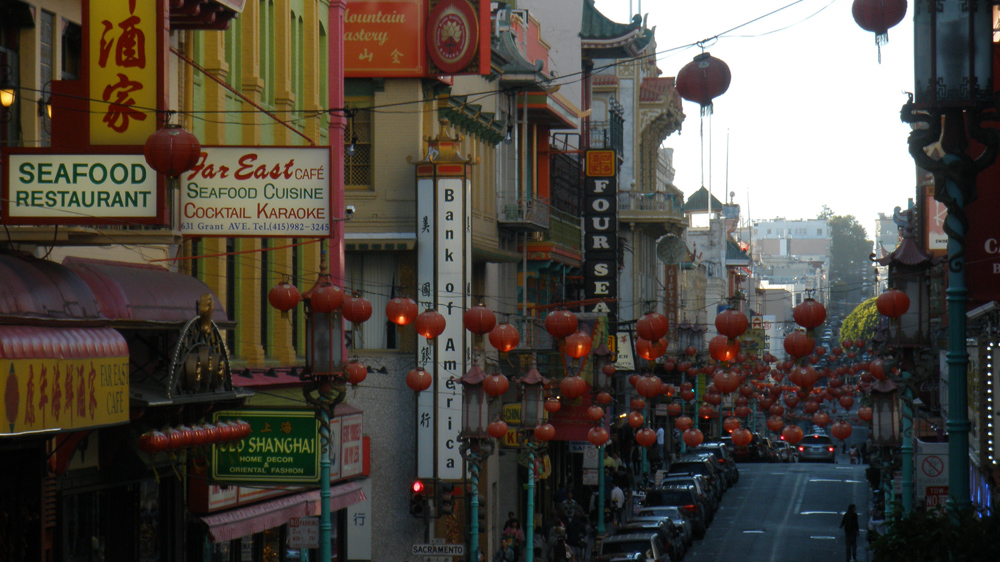 Traditional Chinese lanterns in Chinatown in San Francisco. The development of cities has been pressuring Chinese communities to move out of the neighbourhoods where they have been living for decades. The city's mayor has halted the eviction of dozens of Chinese families from their affordable housing [Getty Images]