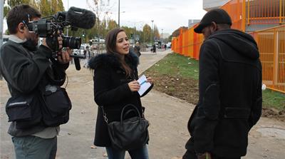Widad believes education is key to empowering Paris' youth. [Al Jazeera]
