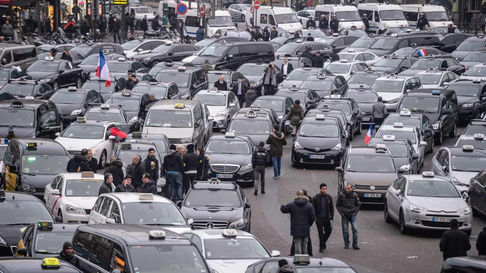 Some 300 taxi drivers, furious over upstart competitors such as Uber, blocked the French capital's ring road [EPA]