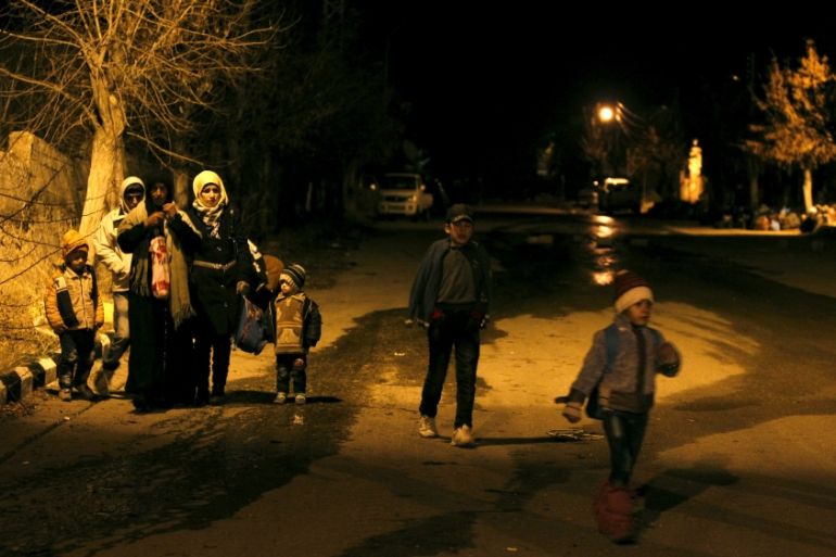 Residents, who say they have received permission from the Syrian government to leave the besieged town, depart after an aid convoy entered Madaya