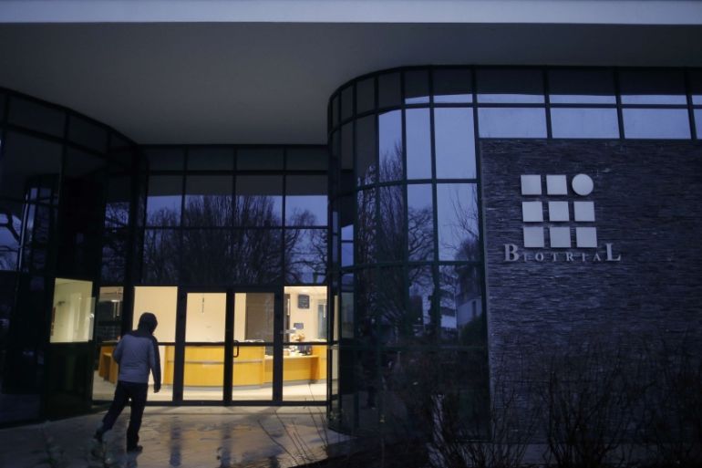 A man enters the Biotrial laboratory building in Rennes