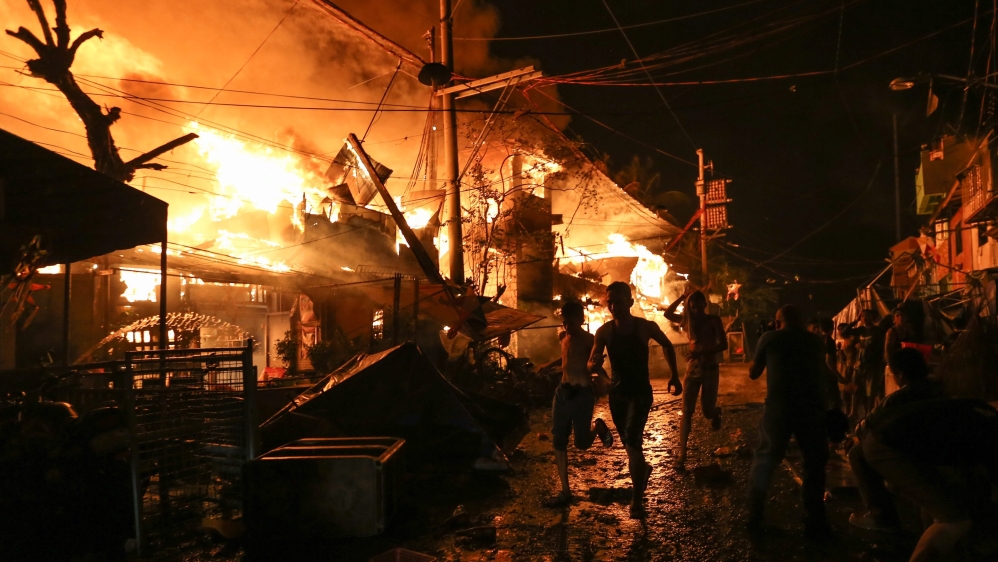 At least 3,000 families lost their homes in the capital Manila on January 1 [Reuters]