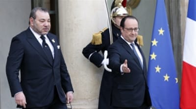 French President Francois Hollande and Morocco's King Mohammed VI leave the Elysee Palace in Paris, France [REUTERS] 