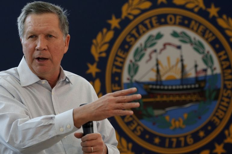 U.S. Republican presidential candidate John Kasich speaks to voters during a campaign town hall in Nashua