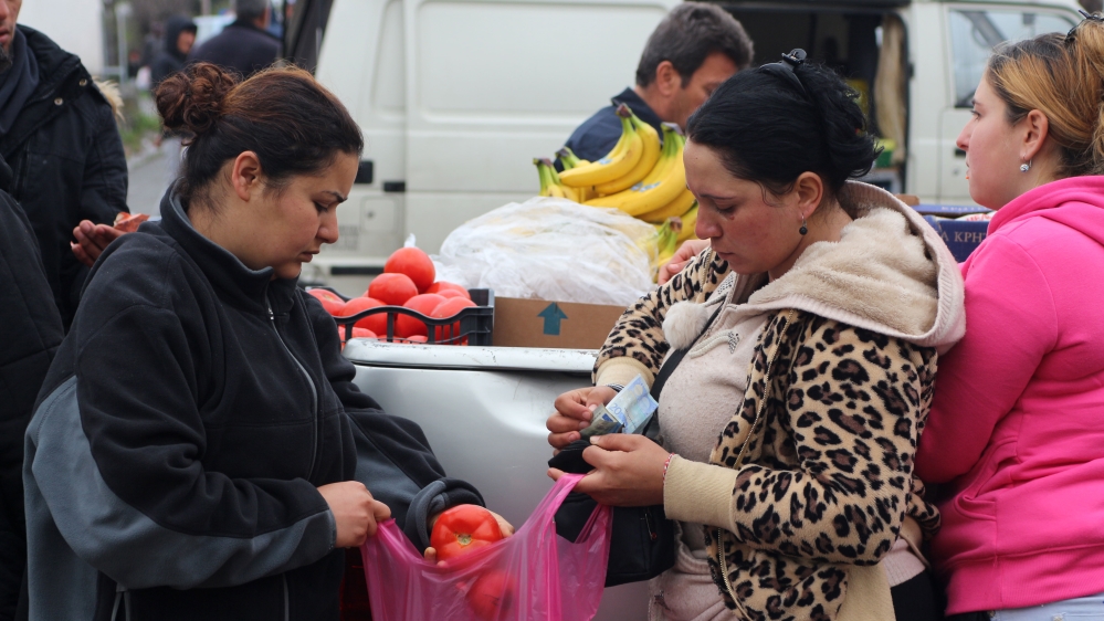 Roma merchants have been supplying fresh produce for those able to purchase food [John Psaropoulos/Al Jazeera]