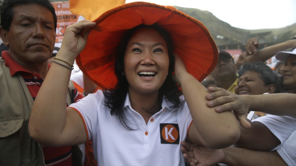  Many credit Keiko Fujimori's father with ending Peru's longstanding conflict with rebels and improving the economy [AP]