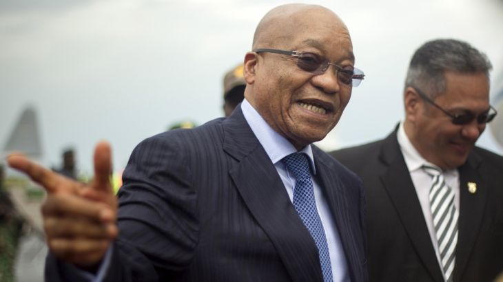 South African counterpart Zuma gestures as he departs at the airport after an Africa Union-sponsored dialogue in an attempt to end months of violence in Burundi''s capital Bujumbura