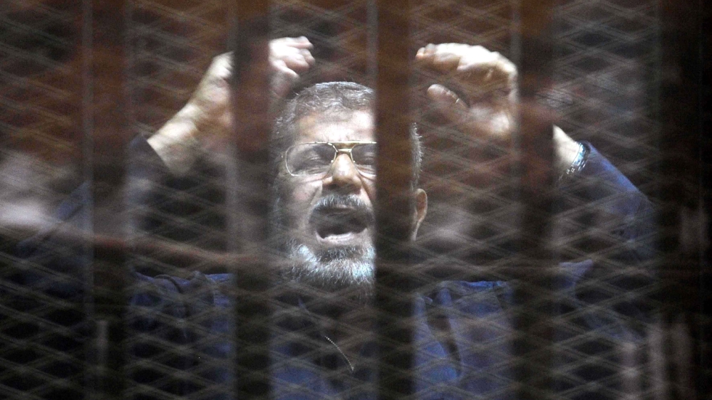 Morsi, in jail since 2013, was sentenced in a separate trial to death over a mass jailbreak [Ali Malki/EPA]