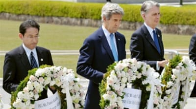 US Secretary of State John Kerry prepares to lay a wreath at the cenotaph with Japan's Foreign Minister Fumio Kishida in Hiroshima. [REUTERS]