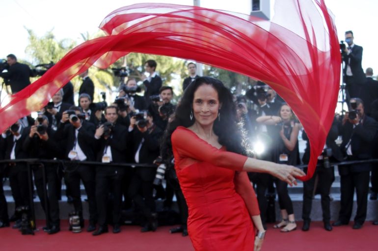 Actress Sonia Braga poses on the red carpet as she arrives for the screening of the film "Elle" in competition at the 69th Cannes Film Festival in Cannes