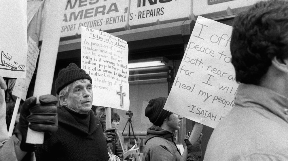 Berrigan went into hiding in the early 1970s after being prosecuted for burning draft cards to protest the Vietnam war [File: Marty Lederhandler/AP]