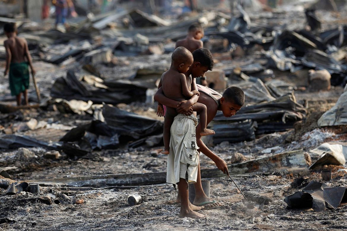 Fire destroyed shelters at a camp for internally displaced Rohingya Muslims