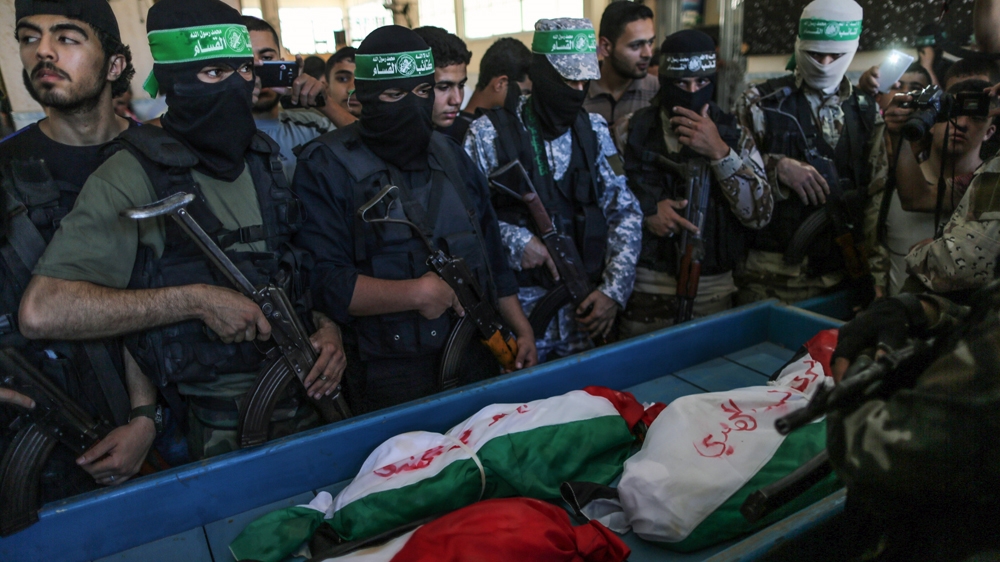 Members of the Palestinian Hamas movement attended the funeral [Ezz Zanoun/Al Jazeera]