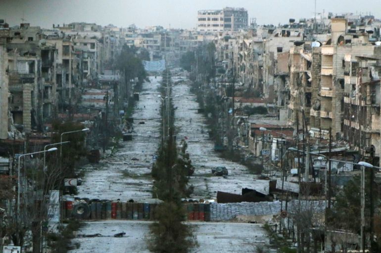 A general view shows a damaged street with sandbags used as barriers in Aleppo''s Saif al-Dawla district