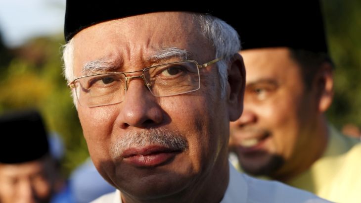 Malaysia''s Prime Minister Najib Razak arrives for a news conference at a mosque outside Kuala Lumpur