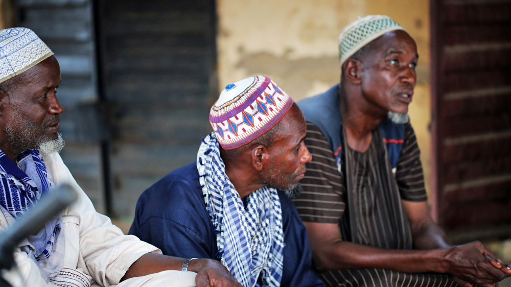 A group of Fulani elders discuss accusations against their community in Akwanga, Nigeria [Chika Oduah/Al Jazeera]