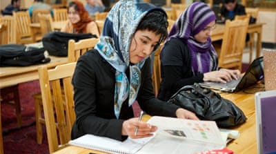 Students study in the library before classes at the American University of Kabul [Getty Images]