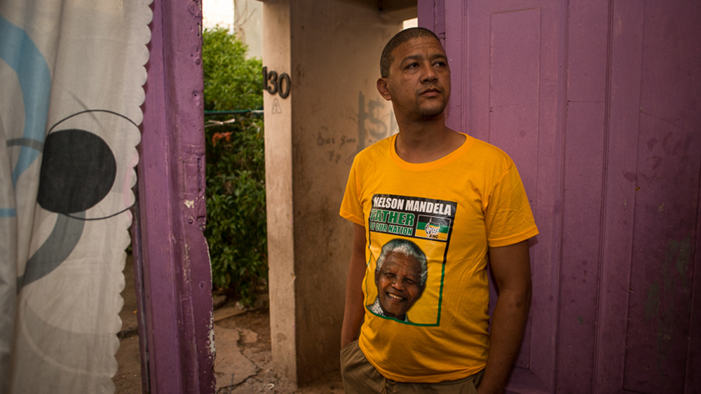 Graham Beukes at his home in Woodstock. Beukes faces eviction in August after living here for 35 years [Shaun Swingler/Al Jazeera]