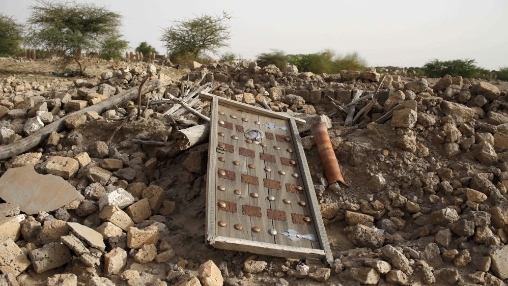 The rubble left from an ancient mausoleum destroyed in Timbuktu [File: Joe Penney/Reuters]