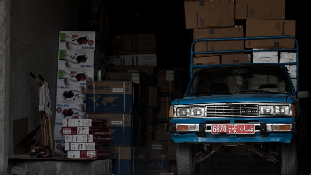 A storage, located few hundreds metres from the port of Khasab, Oman, shows dozens of boxes, on July 26, 2016 [Sebastian Castelier/Al Jazeera]