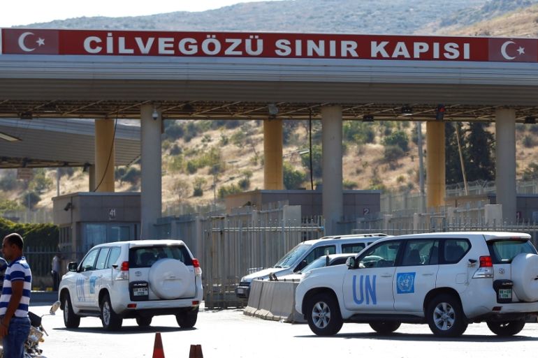 U.N. vehicles enter Syria from Turkey at Cilvegozu border gate, located opposite the Syrian commercial crossing point Bab al-Hawa in Reyhanli