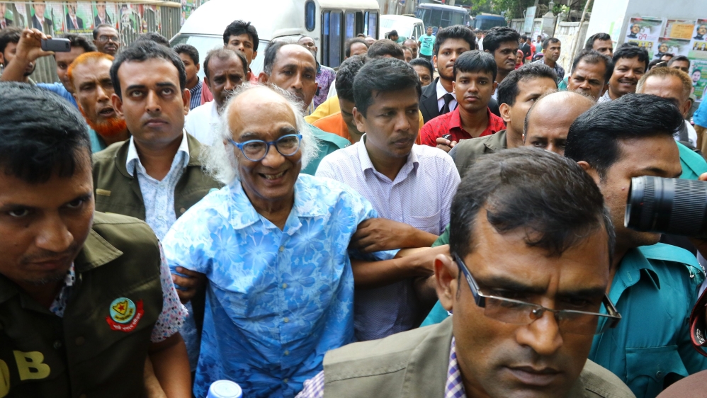 Bangladeshi journalist Shafik Rehman, centre, was arrested for alleged sedition earlier this year [EPA]