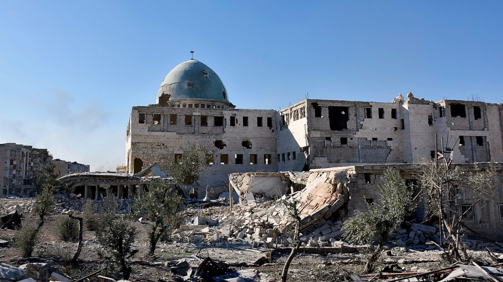 A damaged mosque and buildings in Aleppo's eastern Masaken Hanano area shows the destruction caused [EPA]