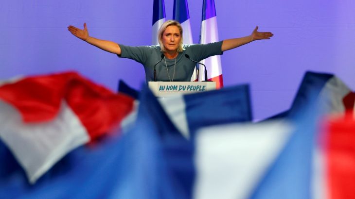 Marine Le Pen, French National Front (FN) political party leader, gestures during an FN political rally in Frejus