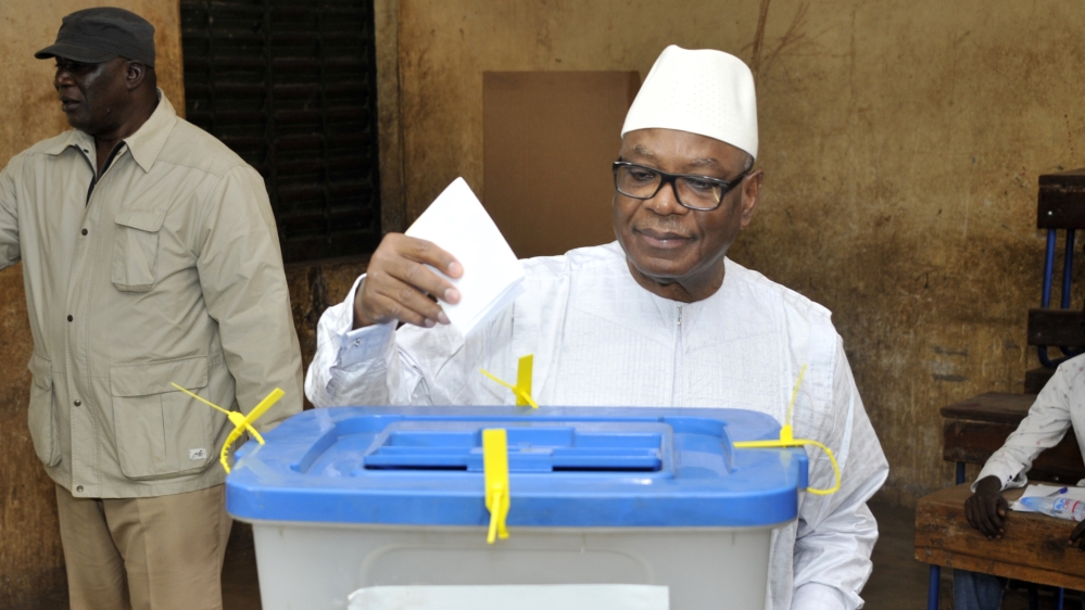 President Ibrahim Boubacar Keita votes on Sunday in Mali's long-awaited elections [Habibou Kouyate/AFP]