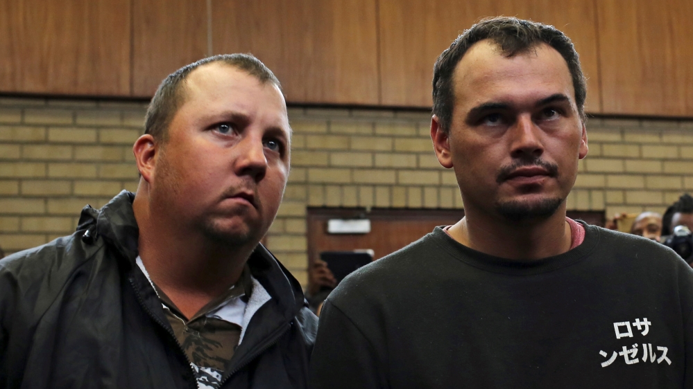 Theo Martins, left, and Willem Oosthuizen first appeared in court in November [Siphiwe Sibeko/Reuters]
