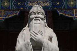 A statue of the Chinese philosopher Confucius, at the Confucian Temple in Beijing, China [Rolex Dela Pena/EPA]