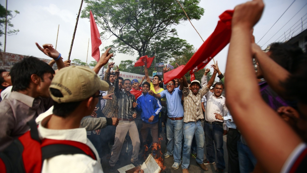 Nepalese students protest against Lokman Singh Karki becoming the chief of Commission for Investigation of Abuse of Authority [Navesh Chitrakar/Reuters]