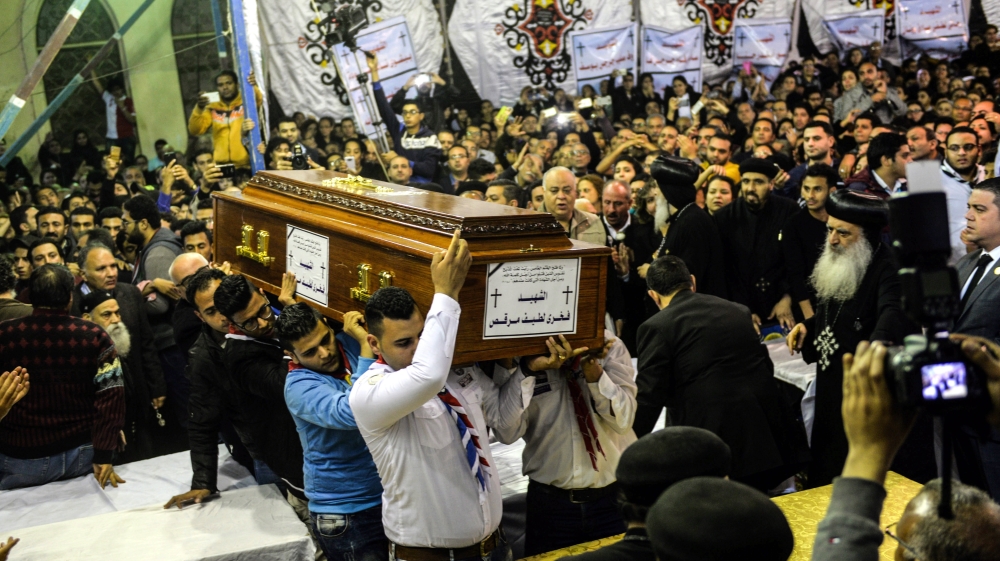 A funeral for victims of a bomb explosion at Mar Girgis Coptic church in Tanta [EPA]