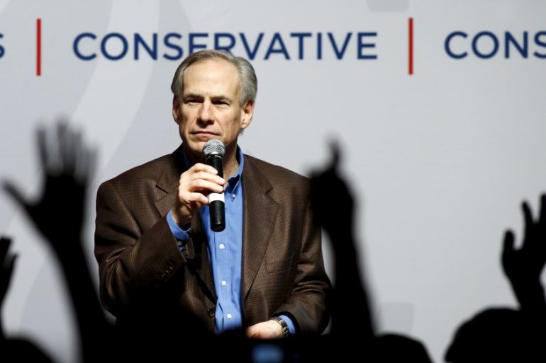 FILE PHOTO: Texas Governor Greg Abbott speaking at a campaign rally for U.S. Republican presidential candidate Ted Cruz in Dallas, Texas