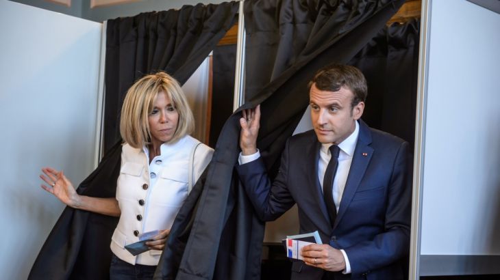 French President Emmanuel Macron and wife Brigitte vote in parliamentary elections in Le Touquet