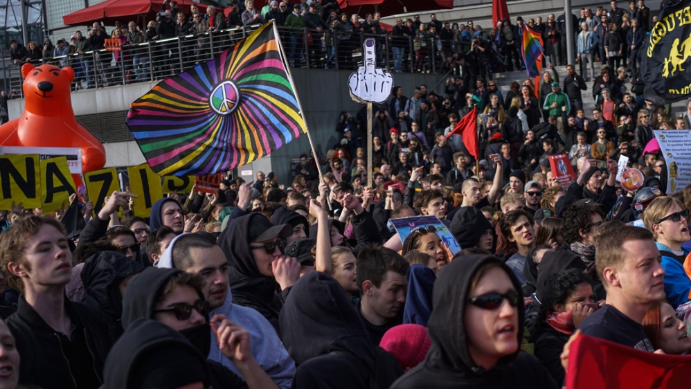 Anti-fascists rallied against a far-right demonstration in Berlin on March 4 [Sorin Furcoi/Al Jazeera]