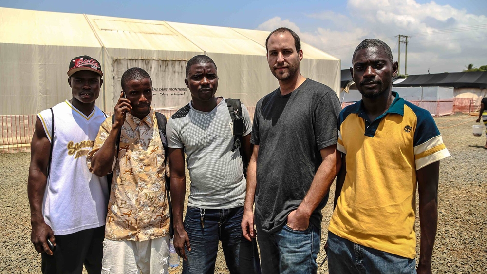 Ashoka Mukpo, second from right, with a group of survivors from Doctors Without Borders, Monrovia, 2015 [Photo courtesy of Ashoka Mukpo]