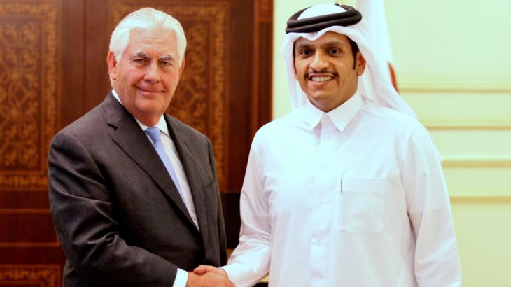 FILE PHOTO - Qatar''s foreign minister Sheikh Mohammed bin Abdulrahman al-Thani (R) shakes hands with U.S. Secretary of State Rex Tillerson following a joint news conference in Doha