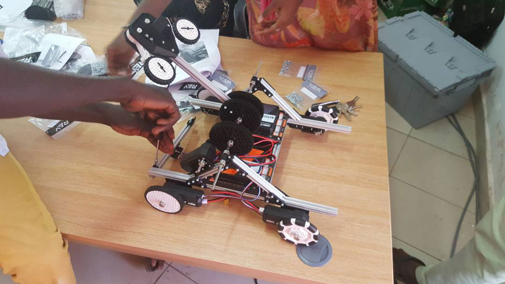 Students designed a robot to compete in the FIRST Global event in the United States [Moctar Darboe/Al Jazeera] 