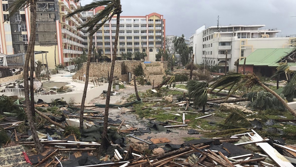 Hurricane Irma destroyed buildings and uprooted trees in Saint Martin [Jonathan Falwell/AP]