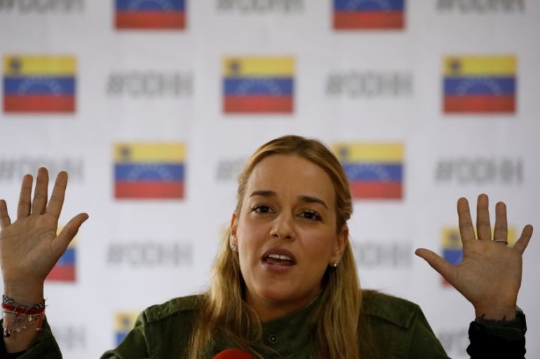 Human rights activist Lilian Tintori, wife of opposition leader Leopoldo Lopez, gestures during a news conference in Caracas