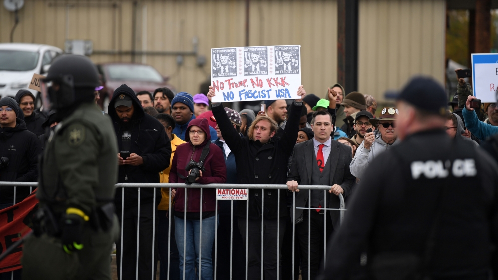 Counterprotesters line the street across from a White Lives Matter rally in Shelbyville, Tennessee [Bryan Woolston/Reuters] 