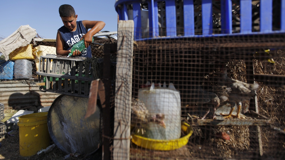 Palestinians often have their water tanks confiscated and water pipes cut by Israeli authorities [File: AP]