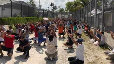 Refugees in the Manus detention centre protest against the way they are treated by crossing their arms [Courtesy @ManusAlert Telegram]