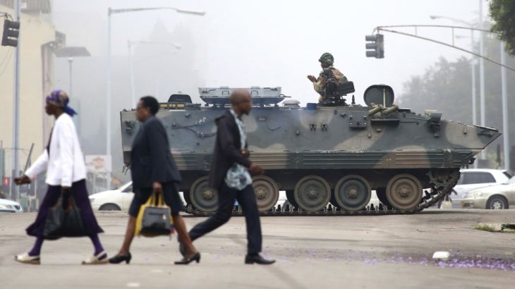 An armed soldier patrols a street in Harare, Zimbabwe, Wednesday, Nov. 15, 2017. Zimbabwe''s army said Wednesday it has President Robert Mugabe and his wife in custody and is securing government office