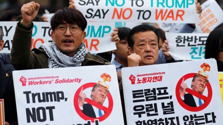 Protesters take part in a rally against U.S. President Donald Trump near South Korea''s presidential Blue House in central Seoul