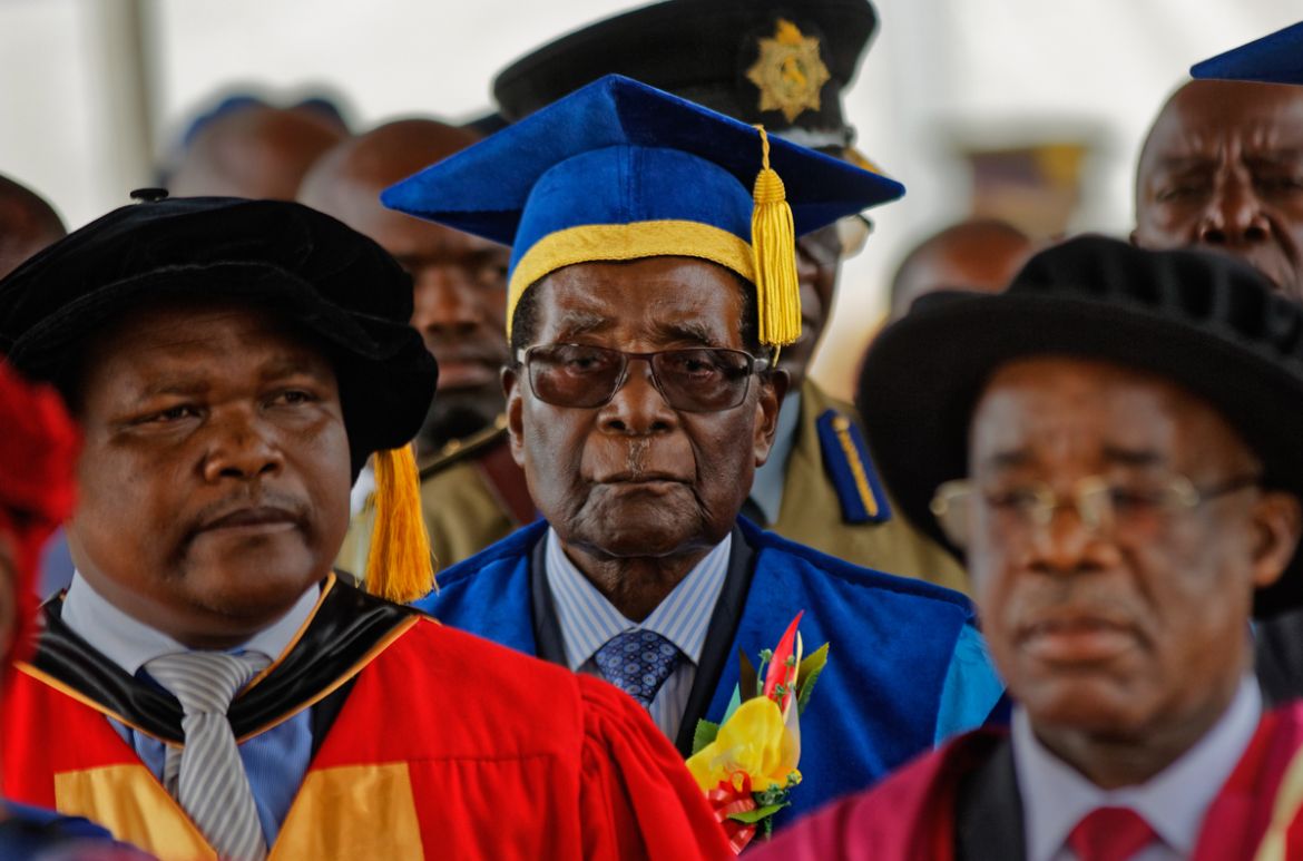 Zimbabwe''s President Robert Mugabe, center, arrives to preside over a student graduation ceremony at Zimbabwe Open University on the outskirts of Harare, Zimbabwe Friday, Nov. 17, 2017. Mugabe is maki