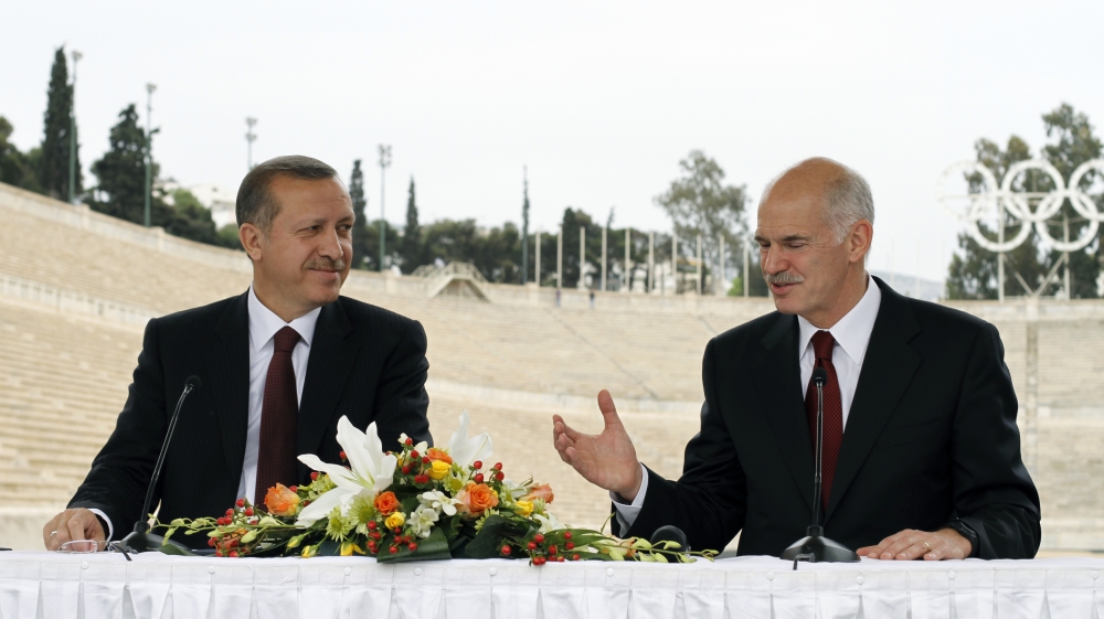 Erdogan speaks to then-Greek Prime Minister George Papandreou during his last visit to Athens in 2010 [File: Kostas Tsironis/Reuters]
