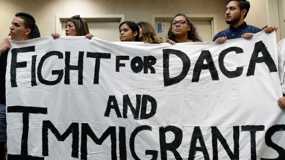 The DACA programme grants protections to about 800,000 people [John Locher/AP Photo] 